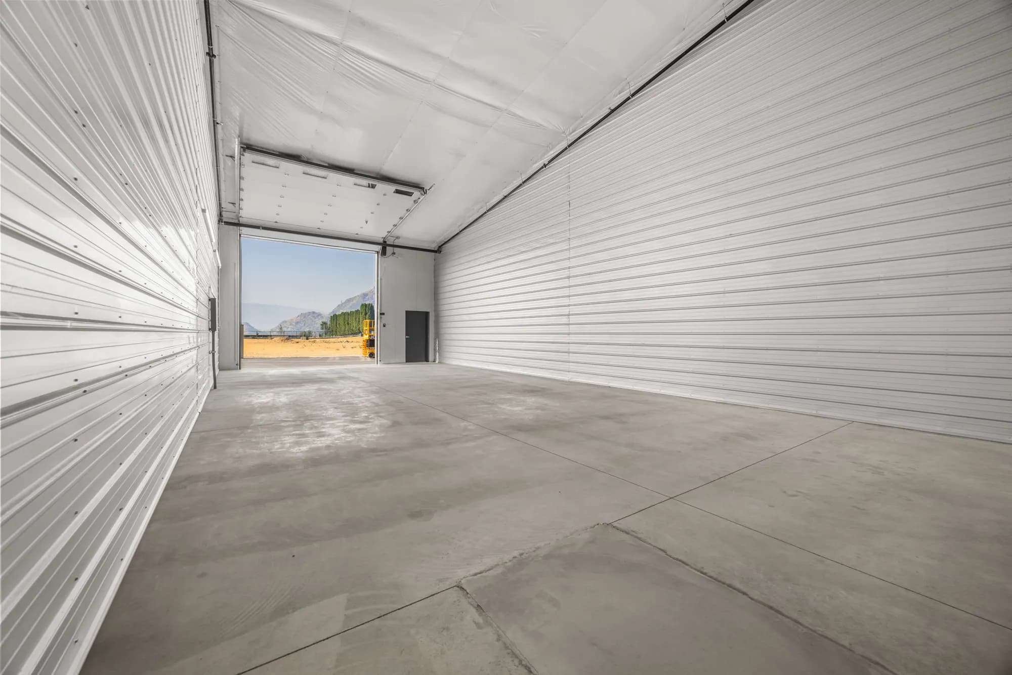 Drive-in garage bay for boat storage on Lake Chelan