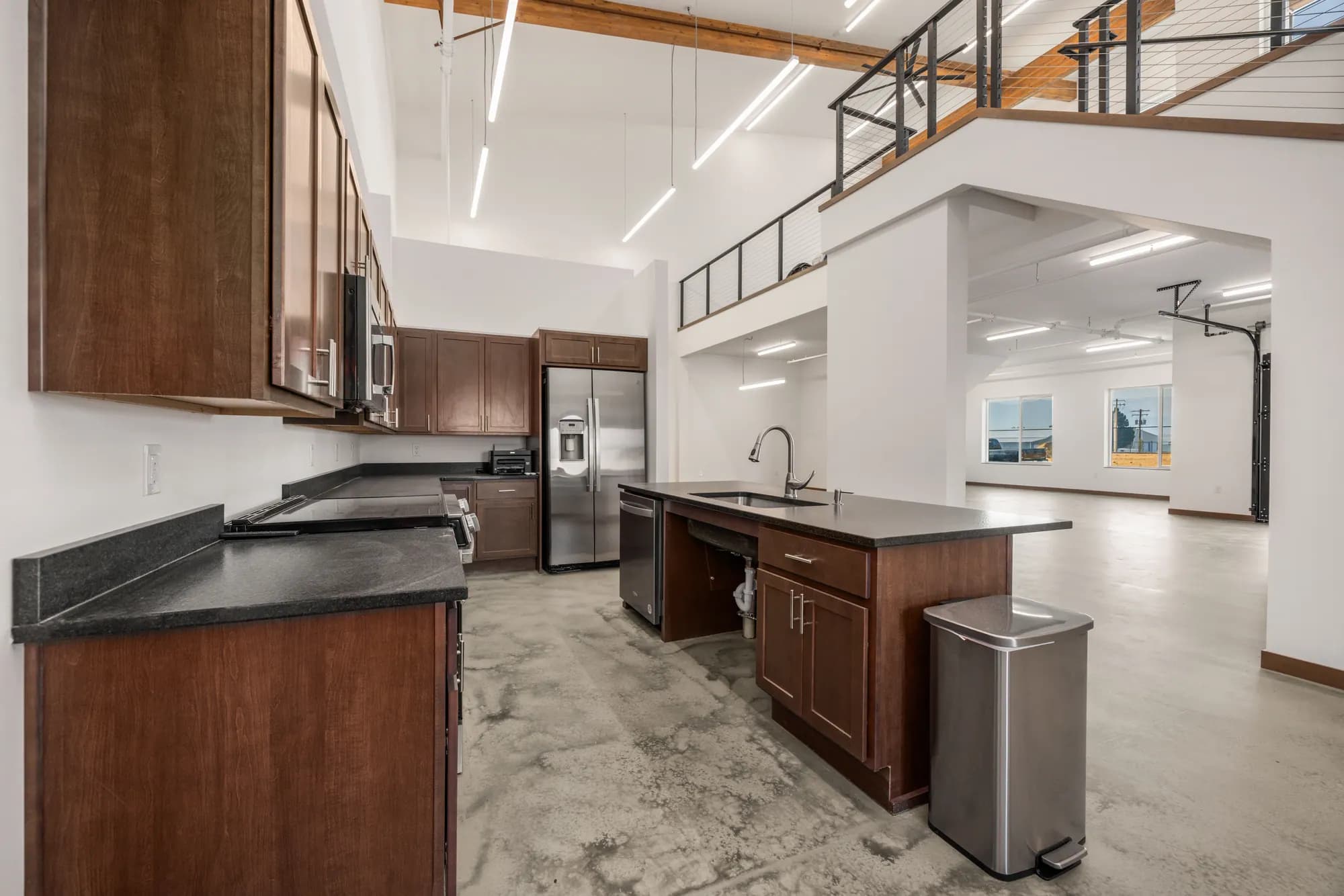 Clubhouse kitchen with island and stainless appliances