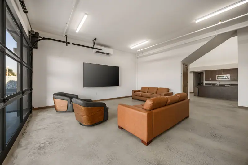 Sunlit Lounge With Wall-Mounted TV