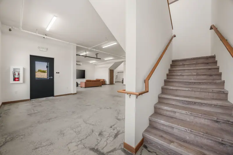 Entry Foyer With Wood Staircase