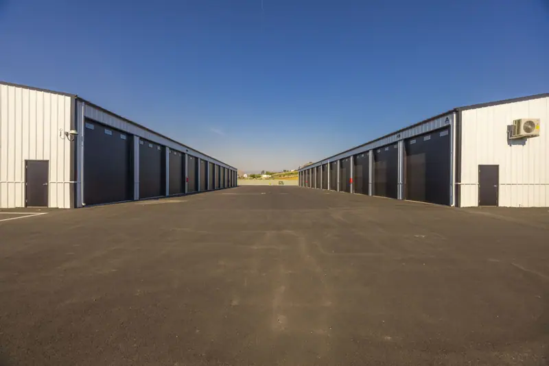 Wide Drive Between Garage Buildings
