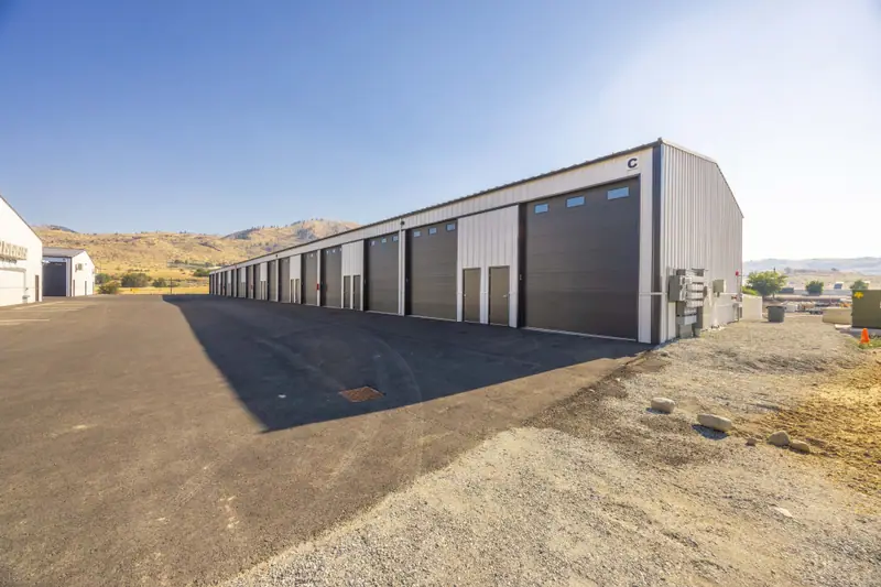 Long Garage Row Against Hillside